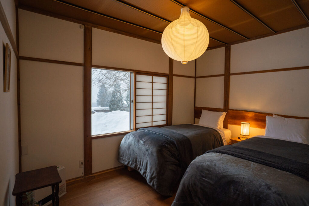 image showing spacious bedroom with open window