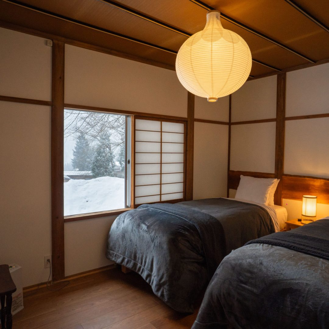 image showing spacious bedroom with open window